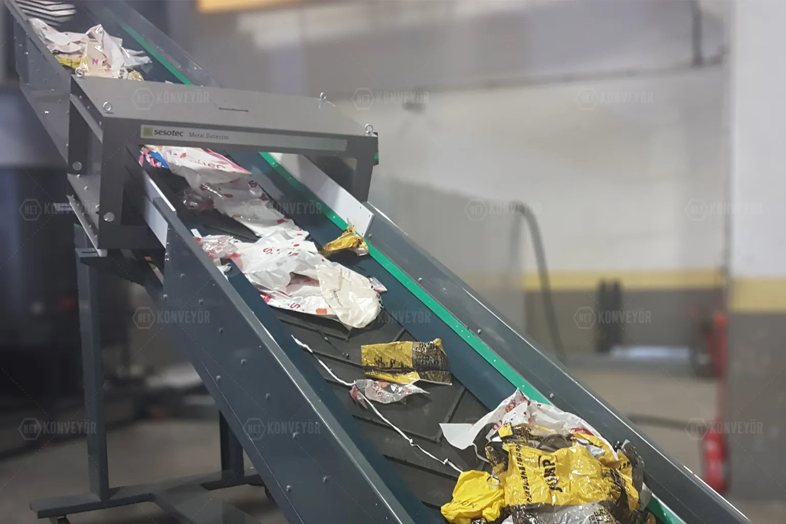 Gummibandforderer